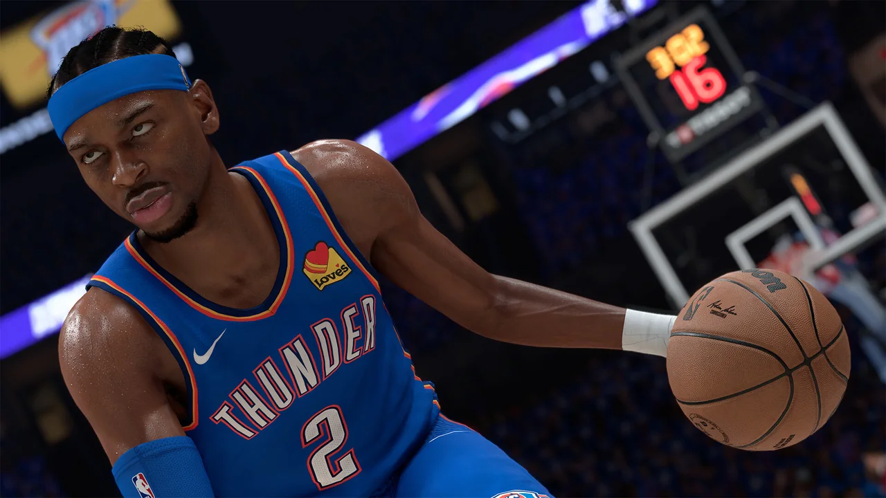 농구 코트에서 공을 드리블하는 선수를 클로즈업한 NBA 2K26 게임 화면